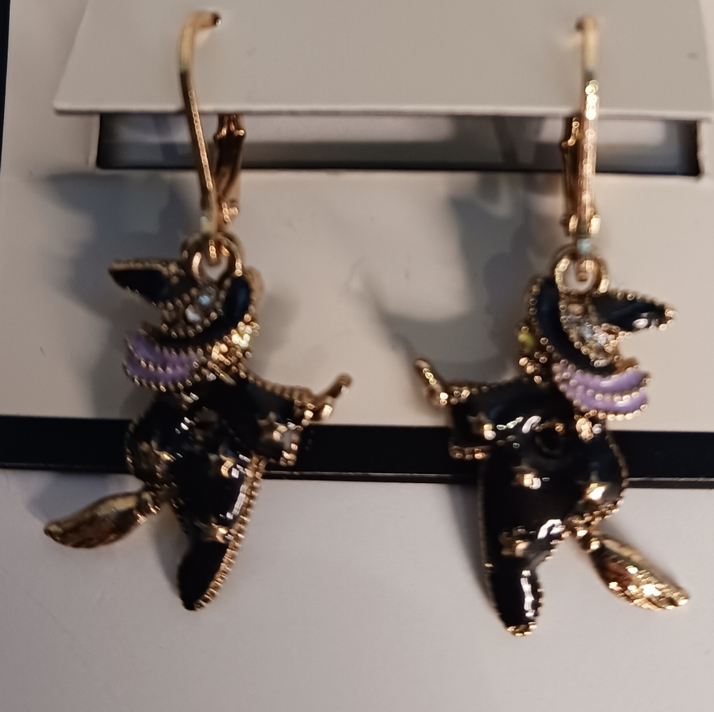 Witch flying on a broom earrings